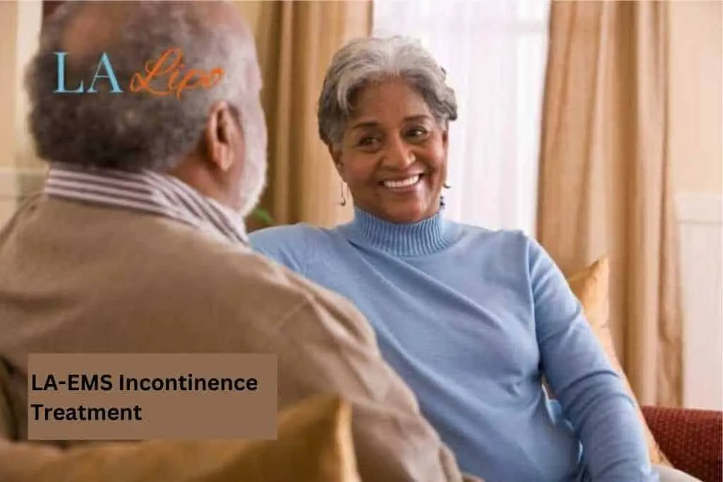 Couple sat smiling at each other - LA-EMS treatment Hitchin