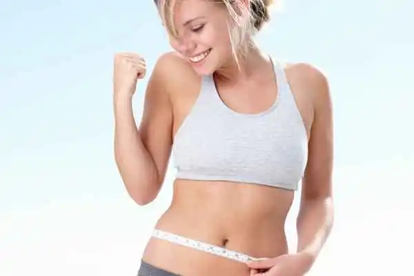 woman happy after fat reduction treatment Hitchin
