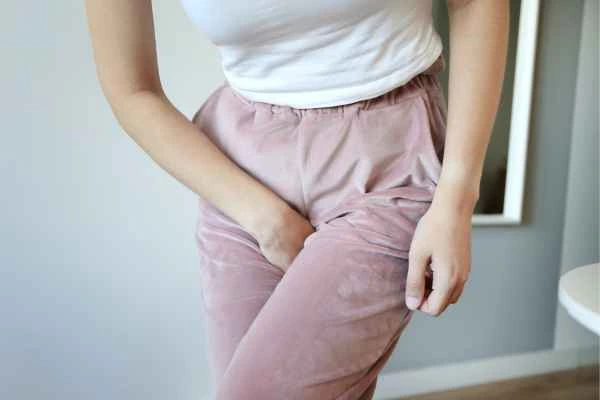 older woman running to the toilet because of urinary incontinence Hitchin